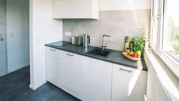 Réfrigérateur, four, plaque de cuisson, lave-vaisselle