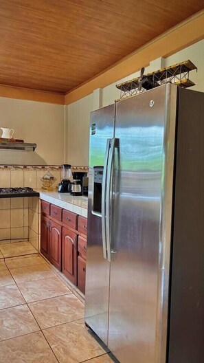 Microwave, stovetop, coffee/tea maker, cookware/dishes/utensils