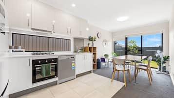 House, Multiple Beds | Private kitchen