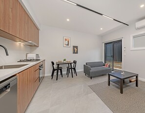 Apartment, 1 Queen Bed | Living area