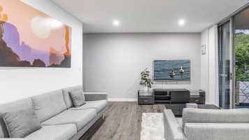 Family Apartment, Multiple Beds | Living area