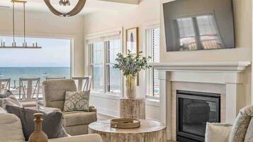 TV, fireplace, books, offices