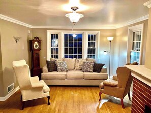 TV, fireplace, books, offices