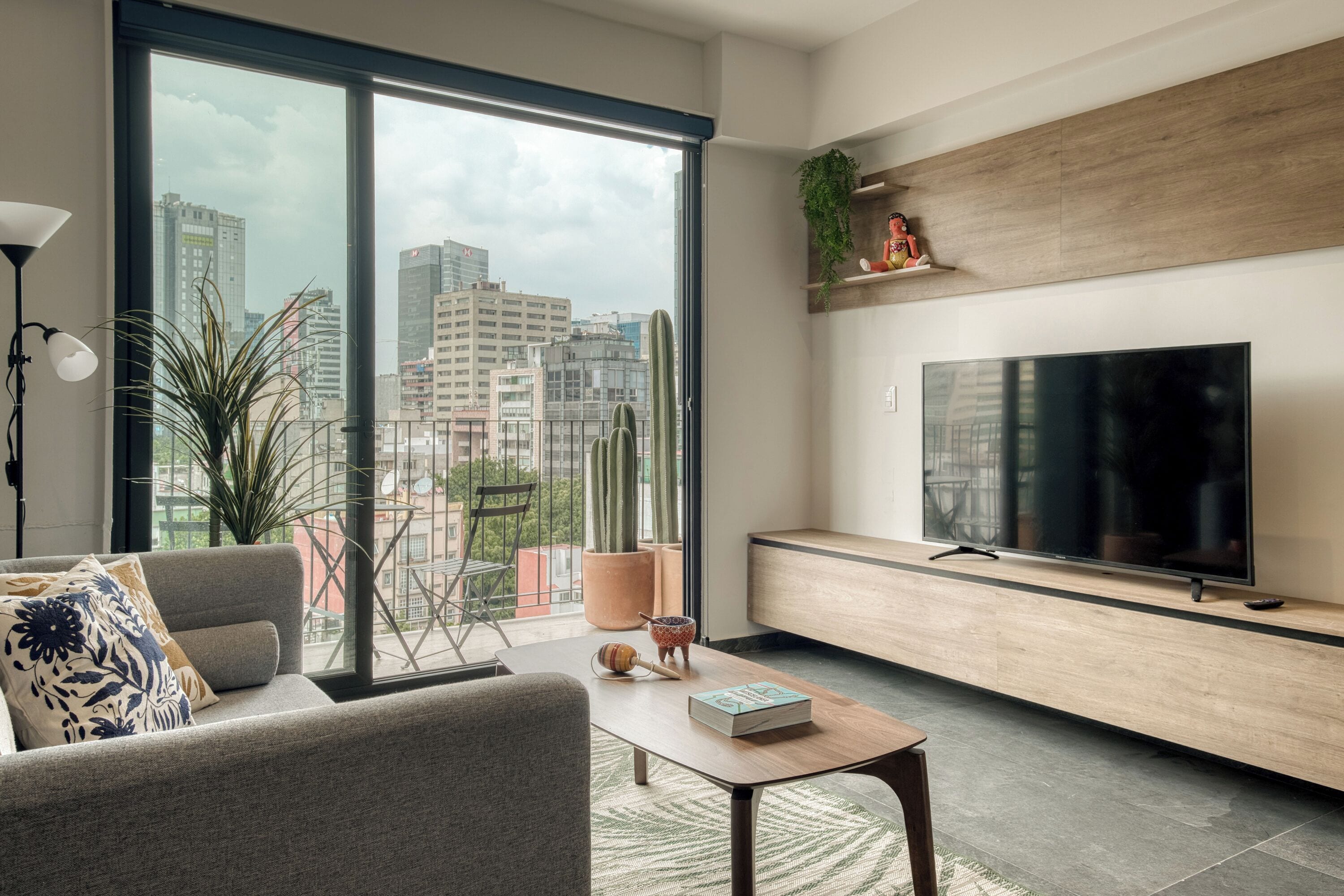 Superior Apartment | Living area | 55-inch Smart TV with satellite channels