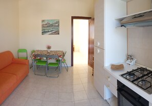 Appart'hôtel, vue ville | Coin séjour