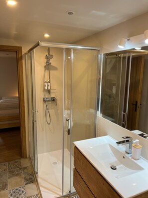 Shower, hair dryer, towels, soap