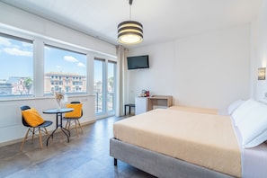 Triple Room, Housekeeping, City View | 1 bedroom, desk, laptop workspace, free WiFi