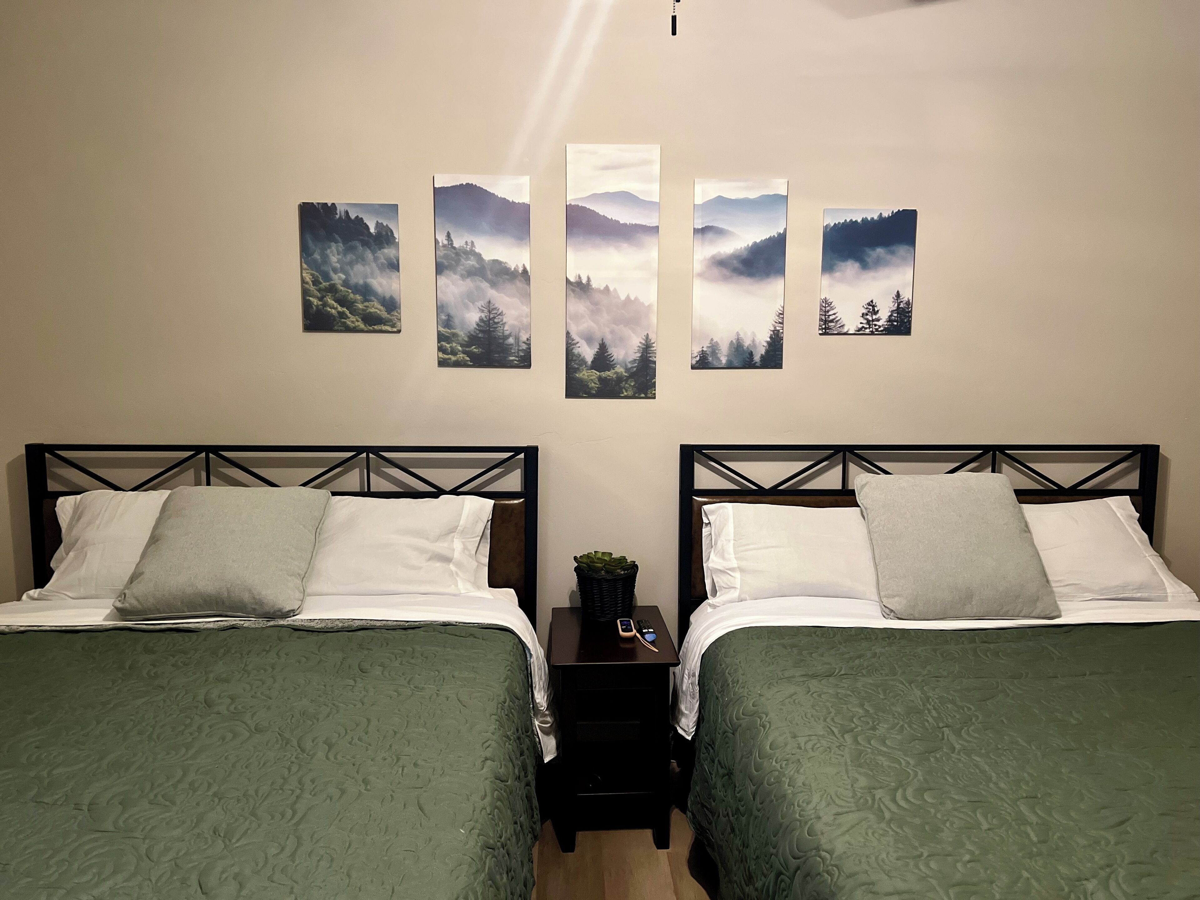 2 bedrooms, desk, iron/ironing board, travel crib