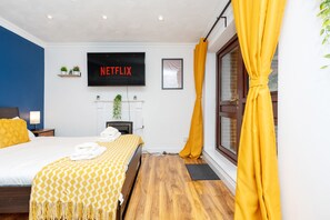 1 habitación, tabla de planchar con plancha, wifi gratis y ropa de cama 