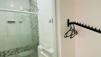 Shower, towels, soap, toilet paper