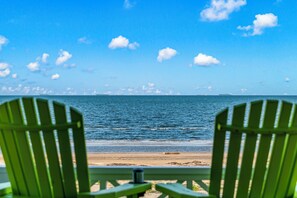 On the beach, sun loungers, beach towels