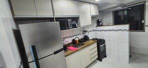 Family Apartment, 2 Bedrooms, Kitchen | Private kitchen | Full-size fridge, microwave, oven, stovetop