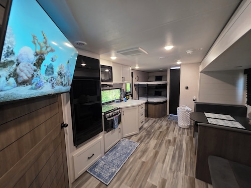 Stay at The Rusty Hooker a Cozy Camper in Perry Fl