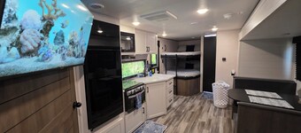 Stay at The Rusty Hooker a Cozy Camper in Perry Fl