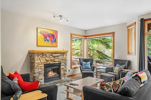TV, fireplace - Riverbend Retreat | Hot Tub | Pools | Pets | Creek (Panorama)