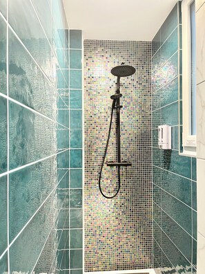 Shower, hair dryer, towels, soap