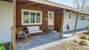 A wooden house with a porch, a white door, and a window. - Steps to Beaches & Main Street: Hyannis Retreat (Hyannis)