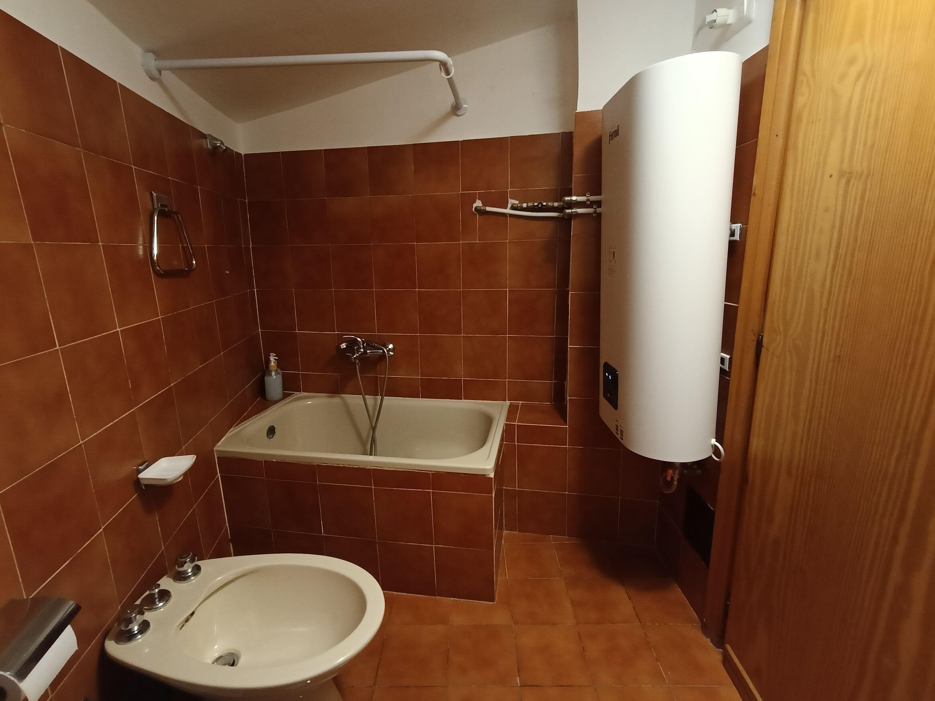 Hair dryer, bidet, towels, soap