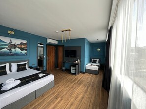 Family Triple Room, City View | In-room safe, desk, laptop workspace, soundproofing - Hmz Premium (Cekmekoy)