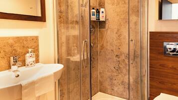 Shower, hair dryer, towels, soap
