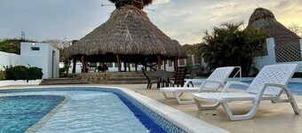 Spacious cabin with pool and kiosk in Palmarito