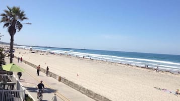 On the beach, sun-loungers