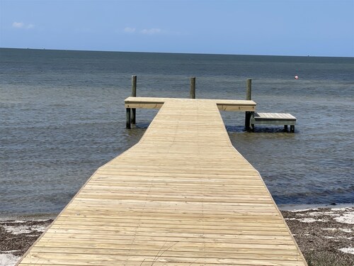 Cypress Cove, situated in Buxton on a soundfront lot, provides a peaceful setting in this charming rental cottage.