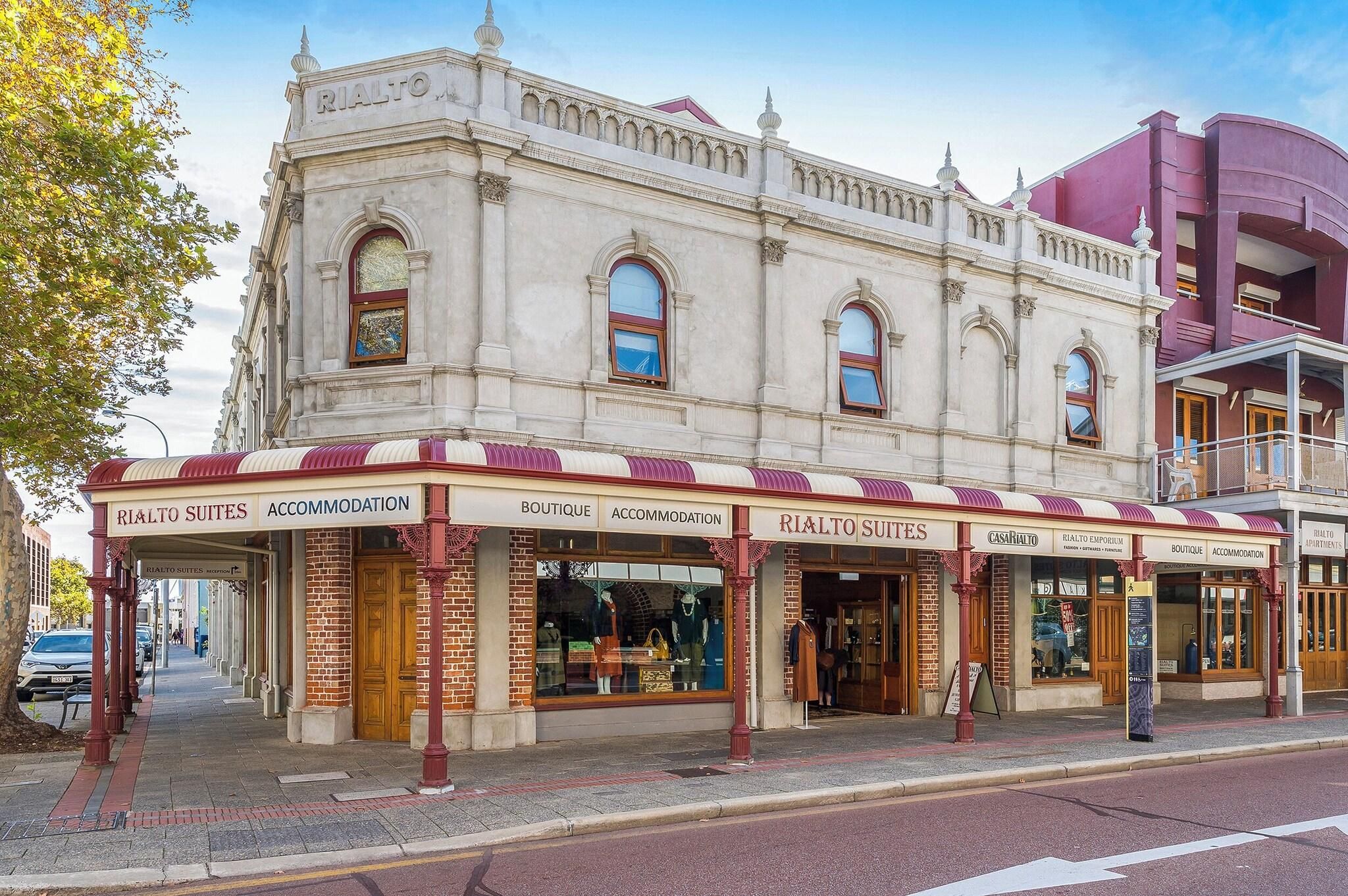 A historic building with a ground-floor boutique and accommodation on the ground level.