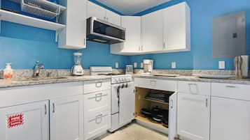 Microwave, toaster, dining tables