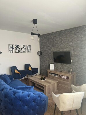 TV, fireplace, books