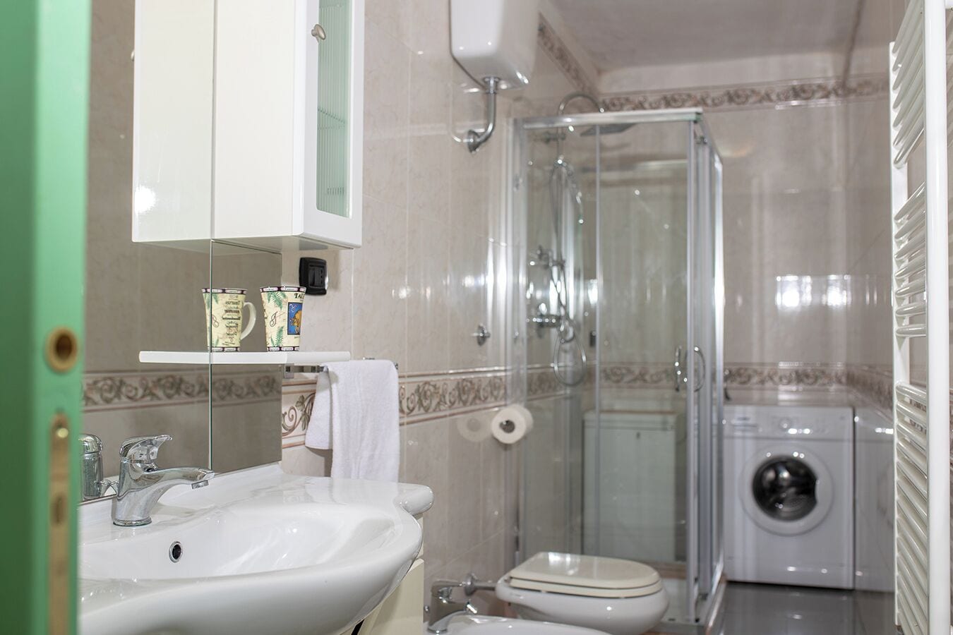 Family Apartment, Courtyard View | Bathroom | Shower, free toiletries, hair dryer, towels