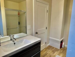Hair dryer, towels, soap, toilet paper