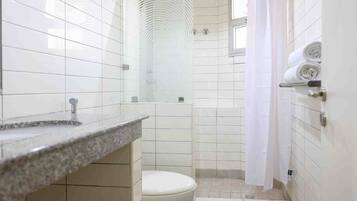 Family Apartment, City View | Bathroom | Free toiletries, slippers, soap, shampoo