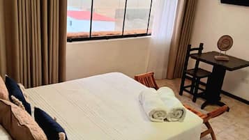 Suite estudio ejecutiva | 1 habitación, ropa de cama de alta calidad y edredón