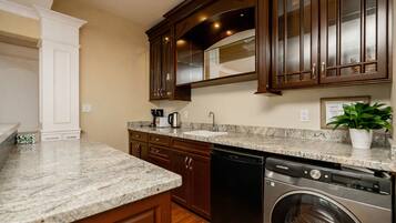 Electric kettle, toaster, paper towels, dining tables