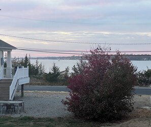 Enjoy a serene lakeside retreat with a porch and stunning views.