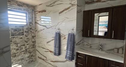 Charming 3-bedroom house with WiFi, AC in welcoming Rincón P.R.