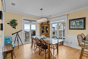 Dining - Experience ocean views at Beach Bubbles, a spacious 5-bedroom, 4-bathroom home in Oak Island (Oak Island)