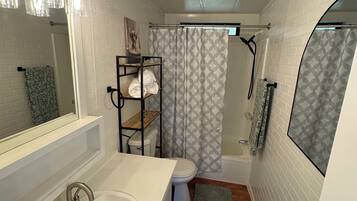 Hair dryer, towels, soap, shampoo