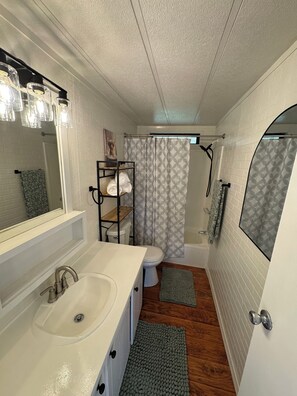 Hair dryer, towels, soap, shampoo