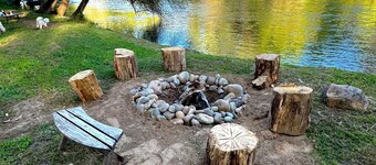 Rustic cozy cabin on rivers edge