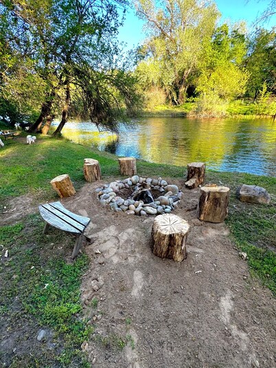 Rustic cozy cabin on rivers edge