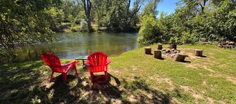 Rustic cozy cabin on rivers edge