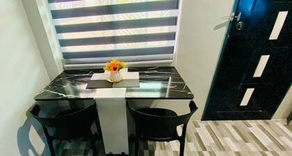 Charming Studio with AC, fully-functional kitchen, and WiFi in Downtown CDO