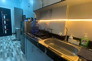 Private kitchen - Studio at Amplayo Apartelle – Stylish, Budget-Friendly City Stay (Cagayan de Oro)