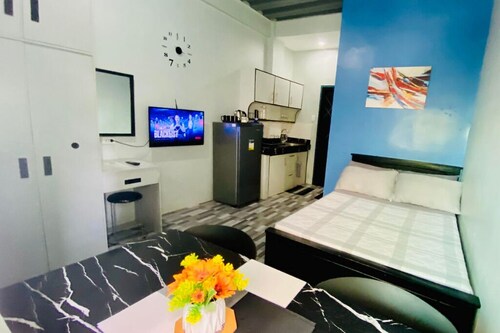 Charming Studio with AC, fully-functional kitchen, and WiFi in Downtown CDO