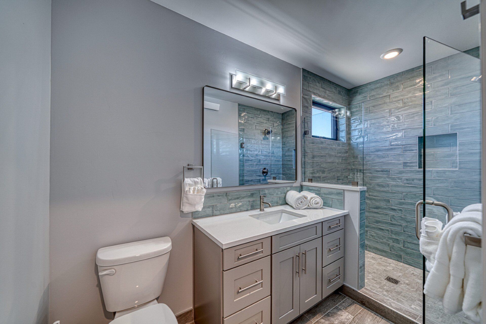 Shower, hair dryer, towels, toilet paper