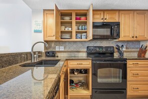Fridge, microwave, oven, stovetop - Beautiful Ocean Front Condo - Cherry Grove (North Myrtle Beach)