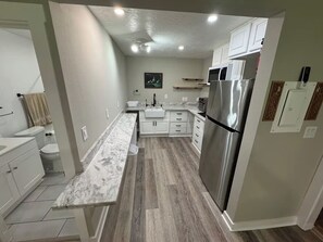 Fridge, microwave, coffee/tea maker, toaster