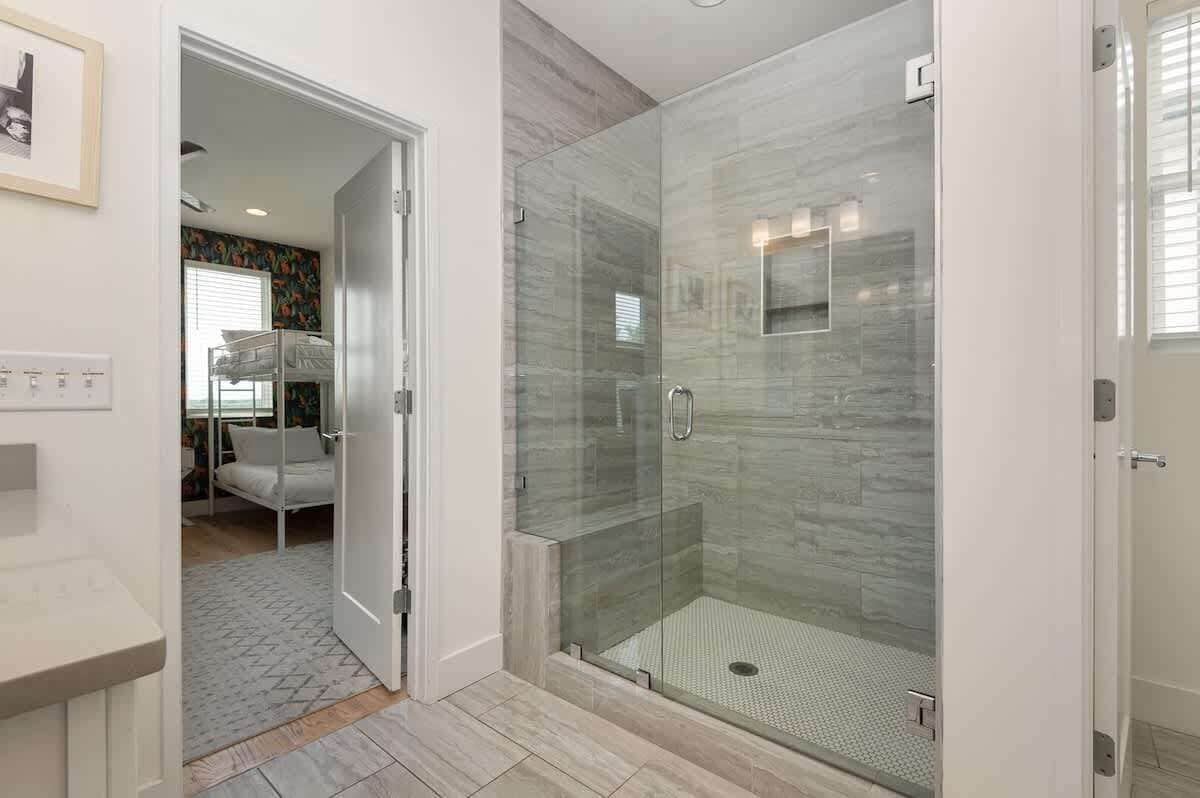 Shower, hair dryer, towels, shampoo